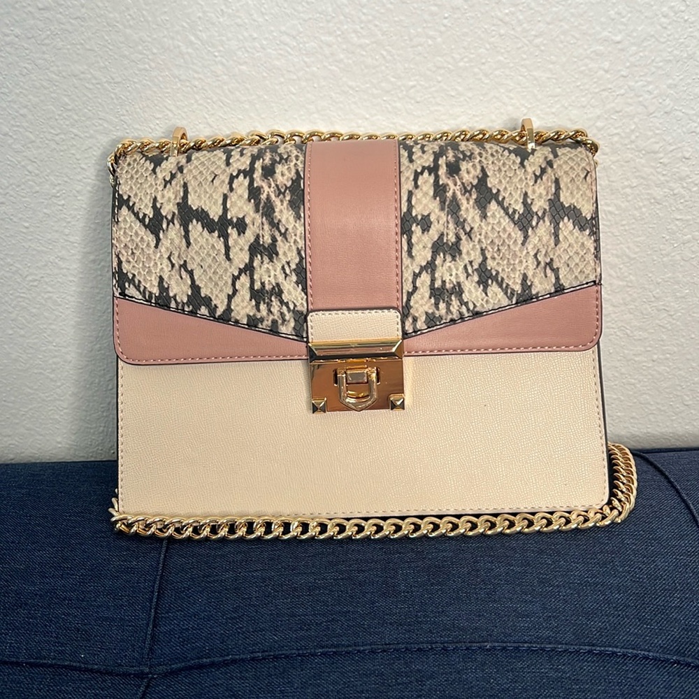 Aldo beige and mauve purse with snake skin design and gold hardware!
